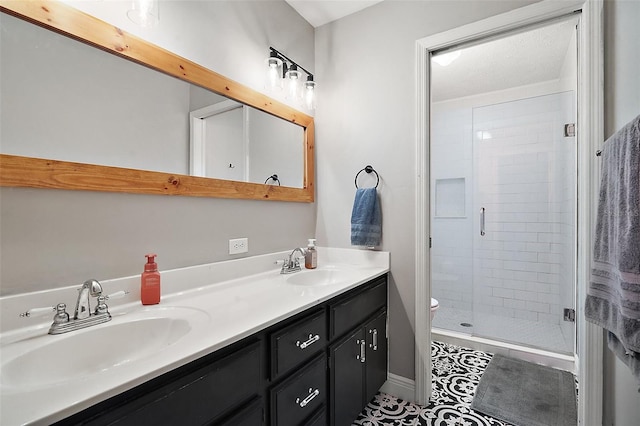 986 SE 57th Ave, Ocala, FL 34480 - full bathroom with double vanity, a stall shower, tile patterned floors, and toilet