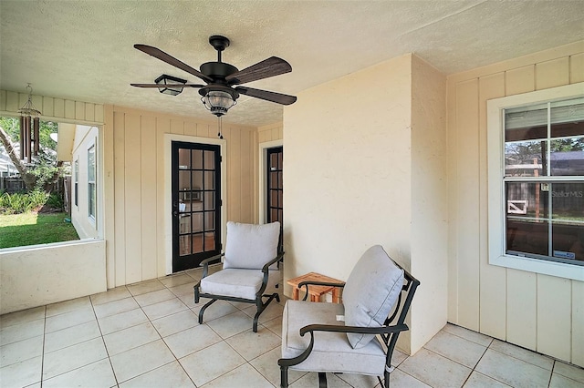 986 SE 57th Ave, Ocala, FL 34480 - sunroom / solarium with healthy amount of natural light and a ceiling fan