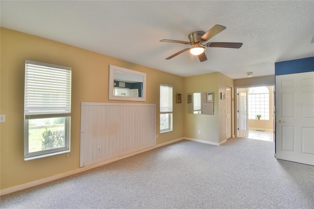 2478 NW 50th Ave, Ocala, FL 34482 - carpeted spare room featuring baseboards and a ceiling fan