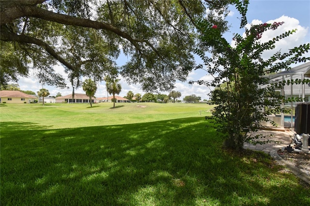 2478 NW 50th Ave, Ocala, FL 34482 - view of grassy yard featuring a swimming pool