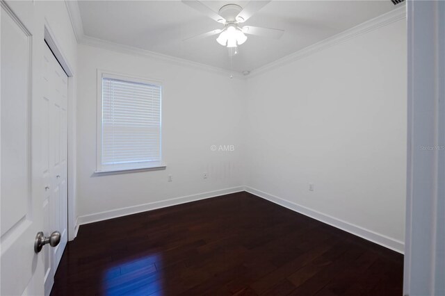 3416 NW 26th St, Gainesville, FL 32605 - unfurnished bedroom with dark wood-style floors, a closet, ornamental molding, and ceiling fan
