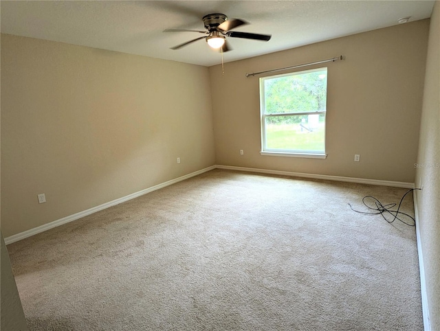 13921 SW 108th Ln, Dunnellon, FL 34432 - carpeted spare room with a ceiling fan, baseboards, and a smoke detector
