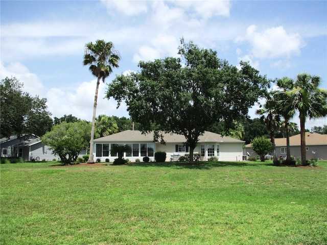 14695 SW 112th Cir, Dunnellon, FL 34432 - rear view of property with a yard