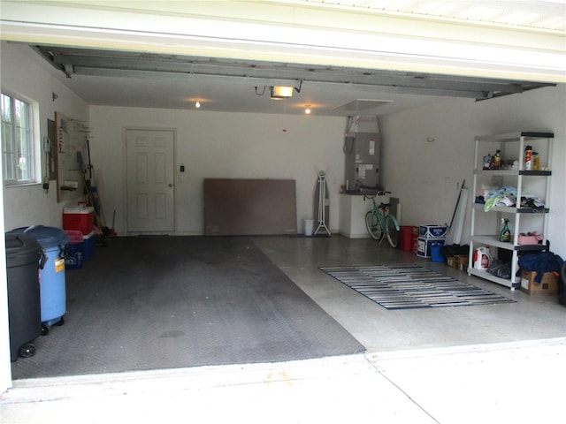 14695 SW 112th Cir, Dunnellon, FL 34432 - garage featuring a garage door opener and heating unit