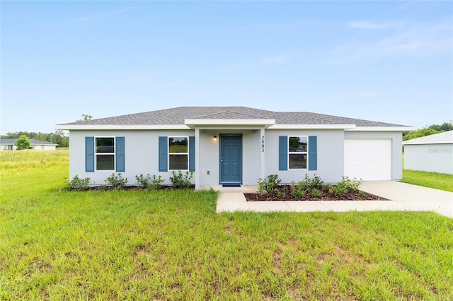 37 Teak Run, Ocala, FL 34472 - single story home with a garage, driveway, a front yard, stucco siding, and a shingled roof