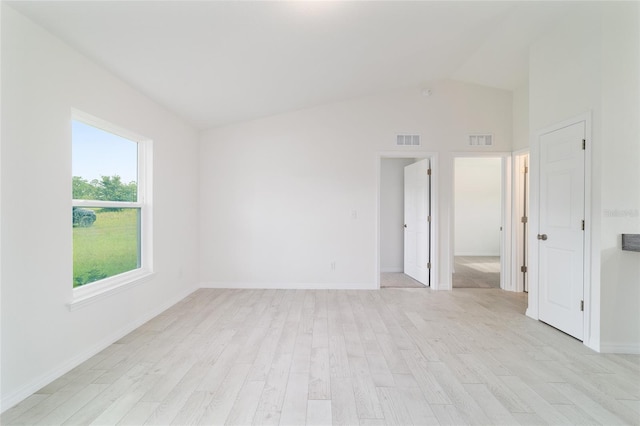 37 Teak Run, Ocala, FL 34472 - empty room featuring light wood-style floors and vaulted ceiling