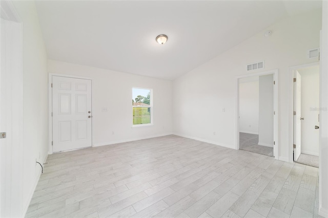 37 Teak Run, Ocala, FL 34472 - unfurnished room featuring lofted ceiling and light wood-type flooring