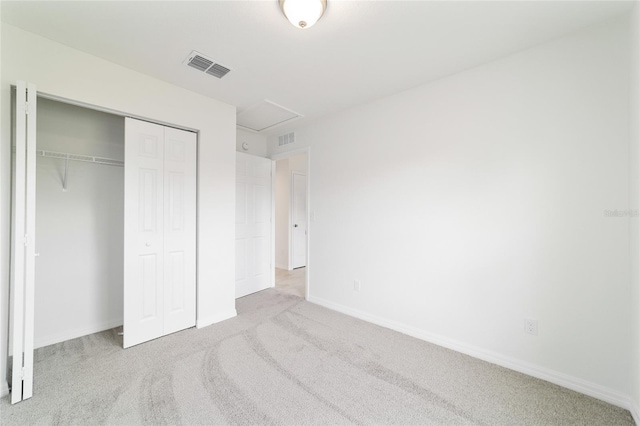37 Teak Run, Ocala, FL 34472 - unfurnished bedroom with carpet flooring, a closet, and attic access
