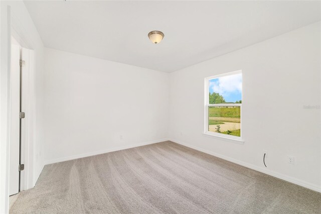6 Locust Loop Crse, Ocala, FL 34472 - spare room featuring light colored carpet