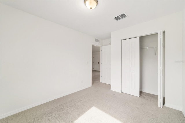 6 Locust Loop Crse, Ocala, FL 34472 - unfurnished bedroom featuring light carpet and a closet