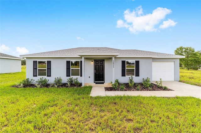 14690 SW 24th Pl, Ocala, FL 34481 - ranch-style home with an attached garage, concrete driveway, a front yard, and stucco siding