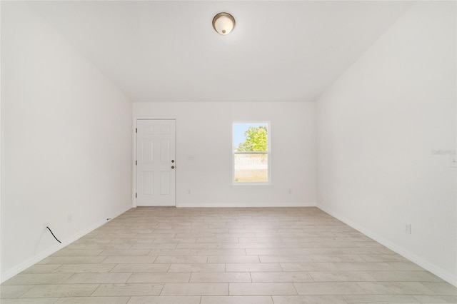 14690 SW 24th Pl, Ocala, FL 34481 - empty room with baseboards and light wood-style floors