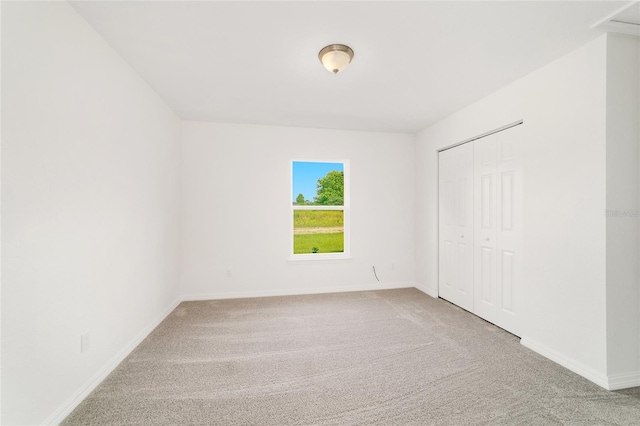 14690 SW 24th Pl, Ocala, FL 34481 - unfurnished bedroom featuring carpet flooring and a closet