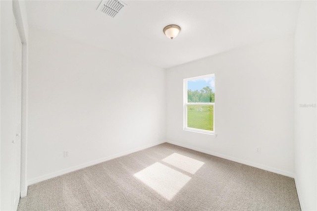 14690 SW 24th Pl, Ocala, FL 34481 - unfurnished room featuring light colored carpet and baseboards
