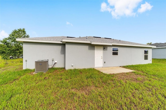 14690 SW 24th Pl, Ocala, FL 34481 - back of house featuring a yard and stucco siding