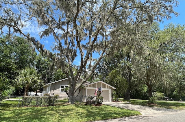 4609 NE 7th St, Ocala, FL 34470 - view of front of house with a garage and concrete driveway