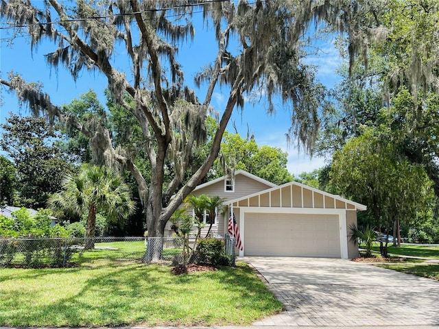 4609 NE 7th St, Ocala, FL 34470 - view of front of house featuring a garage and driveway