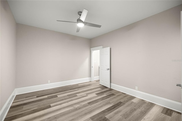 4609 NE 7th St, Ocala, FL 34470 - empty room with wood finished floors and a ceiling fan