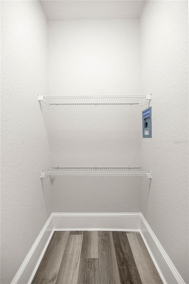 4609 NE 7th St, Ocala, FL 34470 - washroom featuring dark wood-style floors and washer hookup