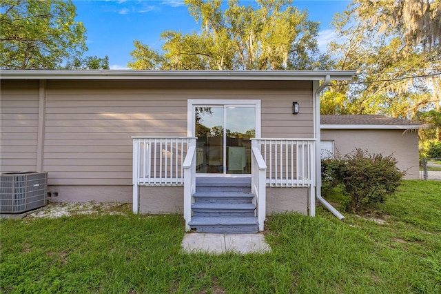 4609 NE 7th St, Ocala, FL 34470 - view of exterior entry featuring a lawn