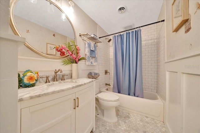 6511 SE 25th Ave, Ocala, FL 34480 - full bathroom with vanity, toilet, shower / tub combo with curtain, and tile patterned flooring