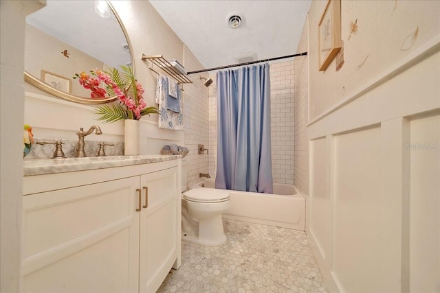 6511 SE 25th Ave, Ocala, FL 34480 - bathroom with toilet, shower / tub combo with curtain, vanity, and tile patterned flooring