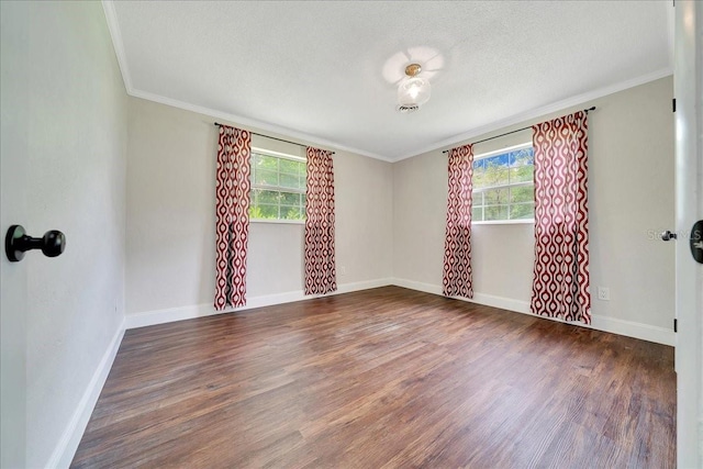 6511 SE 25th Ave, Ocala, FL 34480 - spare room with healthy amount of natural light, wood finished floors, baseboards, ornamental molding, and a textured ceiling