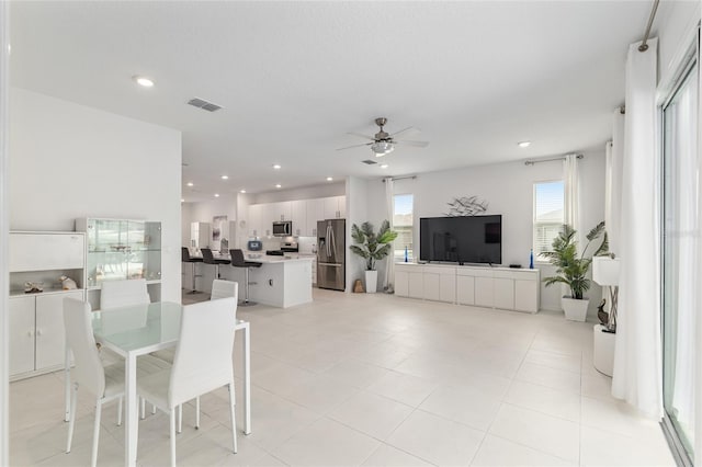 8802 SW 79th Loop, Ocala, FL 34481 - dining area featuring ceiling fan, recessed lighting, and light tile patterned floors