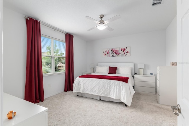 8802 SW 79th Loop, Ocala, FL 34481 - bedroom with light colored carpet and ceiling fan