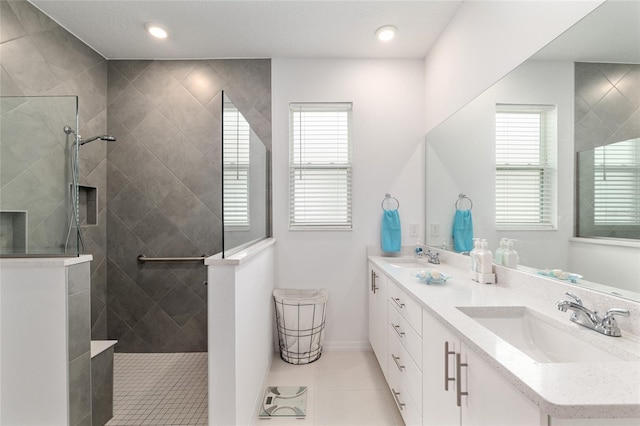 8802 SW 79th Loop, Ocala, FL 34481 - full bath featuring double vanity, healthy amount of natural light, tile patterned floors, walk in shower, and recessed lighting