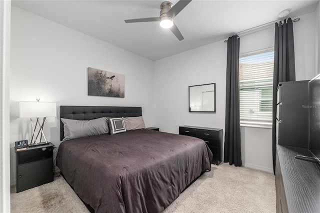 8802 SW 79th Loop, Ocala, FL 34481 - bedroom with light carpet, baseboards, and a ceiling fan