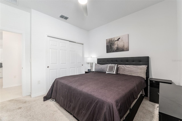8802 SW 79th Loop, Ocala, FL 34481 - bedroom featuring light colored carpet, a closet, a ceiling fan, and baseboards