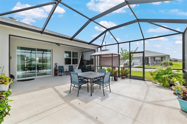 8802 SW 79th Loop, Ocala, FL 34481 - view of patio featuring outdoor dining area and a lanai