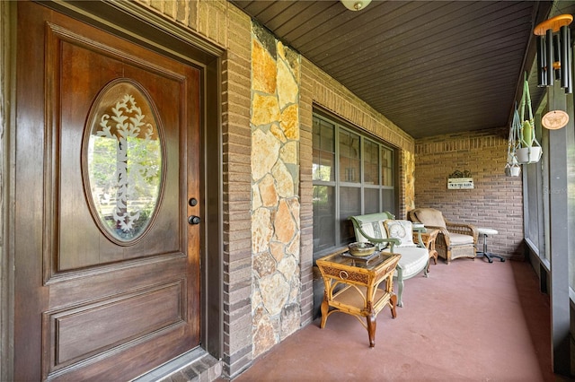 6497 W Anthony Rd, Ocala, FL 34479 - entrance to property featuring covered porch and brick siding