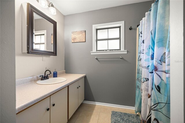6497 W Anthony Rd, Ocala, FL 34479 - full bath featuring vanity, tile patterned flooring, and baseboards