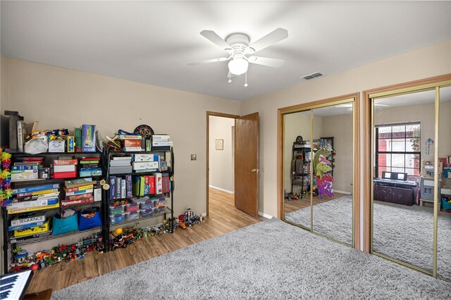 6497 W Anthony Rd, Ocala, FL 34479 - playroom featuring ceiling fan, wood finished floors, and baseboards