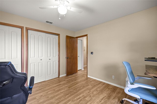 6497 W Anthony Rd, Ocala, FL 34479 - office space with light wood finished floors, a ceiling fan, and baseboards