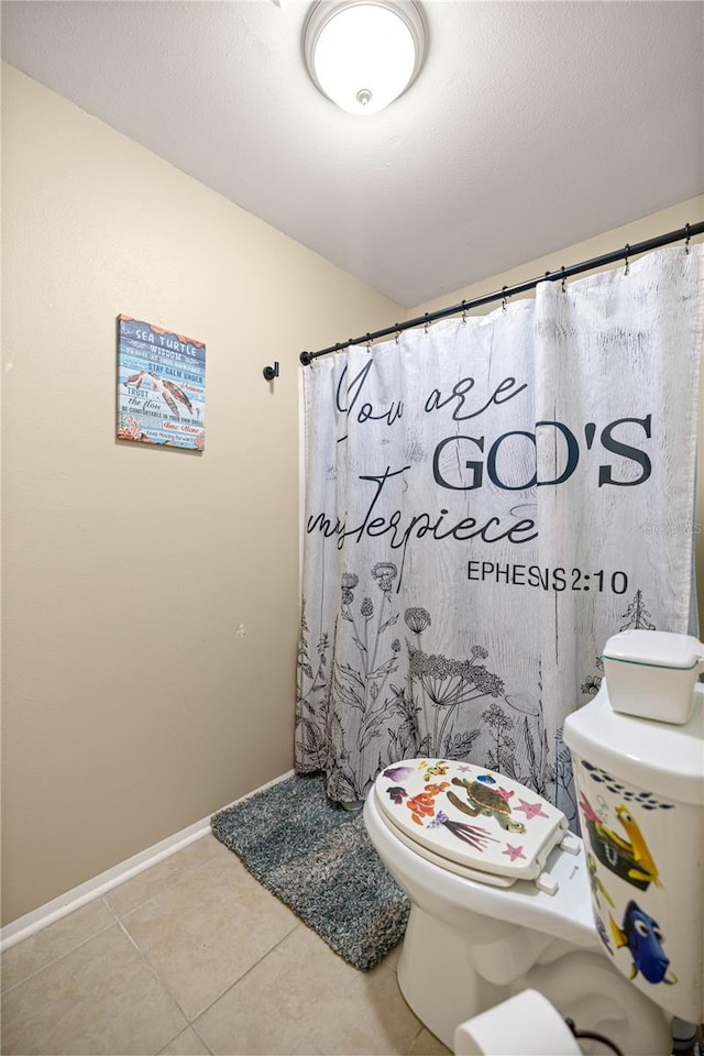 6497 W Anthony Rd, Ocala, FL 34479 - bathroom featuring toilet, tile patterned floors, baseboards, and a shower with curtain