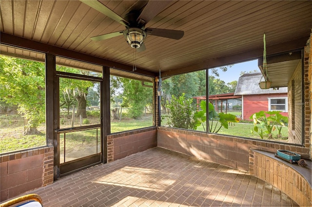 6497 W Anthony Rd, Ocala, FL 34479 - unfurnished sunroom featuring a ceiling fan and healthy amount of natural light
