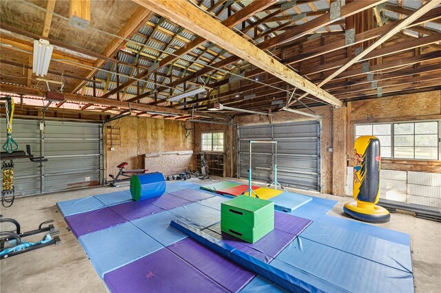 6497 W Anthony Rd, Ocala, FL 34479 - garage featuring a garage door opener