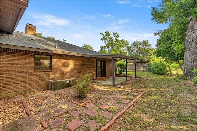 6497 W Anthony Rd, Ocala, FL 34479 - view of yard featuring a patio area