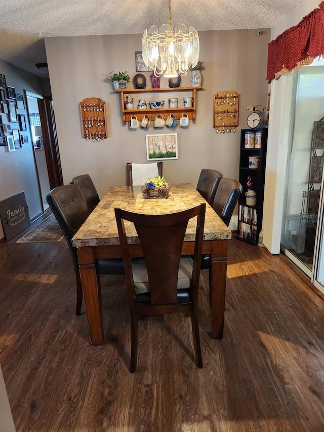 8343 SW 105th Pl, Ocala, FL 34481 - dining room featuring a textured ceiling, dark wood-style floors, and a chandelier