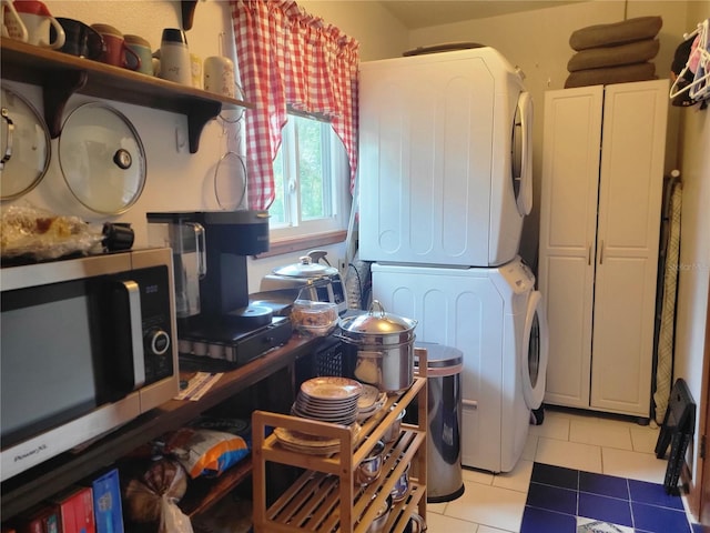 8343 SW 105th Pl, Ocala, FL 34481 - laundry room with stacked washer / dryer and light tile patterned floors