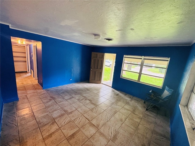 1051 SE 28th Rd, Ocala, FL 34471 - spare room featuring a textured ceiling