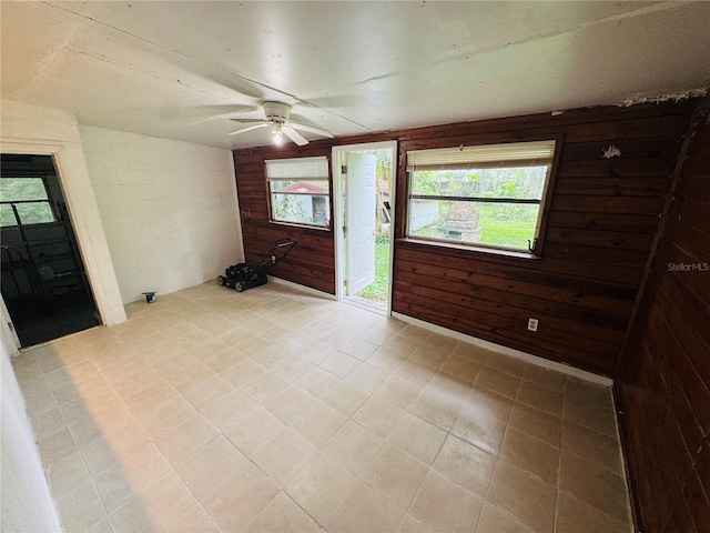1051 SE 28th Rd, Ocala, FL 34471 - unfurnished room featuring ceiling fan and wood walls