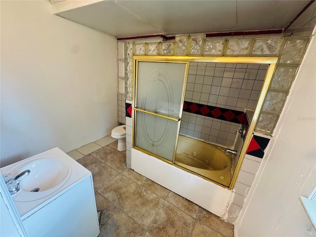 1051 SE 28th Rd, Ocala, FL 34471 - full bathroom with toilet, vanity, and tile patterned flooring