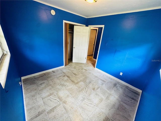 1051 SE 28th Rd, Ocala, FL 34471 - empty room with baseboards, a smoke detector, and ornamental molding