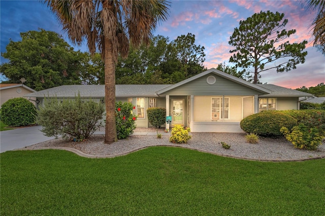 10806 SW 86th Ave, Ocala, FL 34481 - ranch-style house with a front lawn and concrete driveway