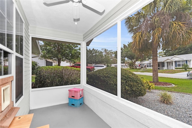 10806 SW 86th Ave, Ocala, FL 34481 - unfurnished sunroom with a ceiling fan