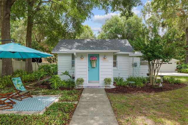 12335 SE 130th Ct, Ocklawaha, FL 32179 - bungalow-style house featuring a shingled roof